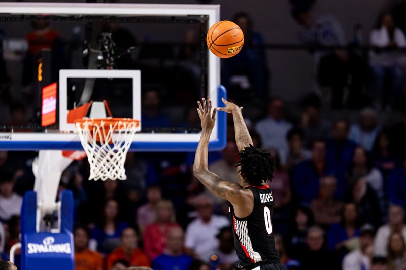 Jan 7, 2023; Gainesville, Florida, USA; Georgia Bulldogs guard Terry Roberts (0) shoots a three pointer during the second half against the Florida Gators at Exactech Arena at the Stephen C. O'Connell Center. Mandatory Credit: Matt Pendleton-USA TODAY Sports