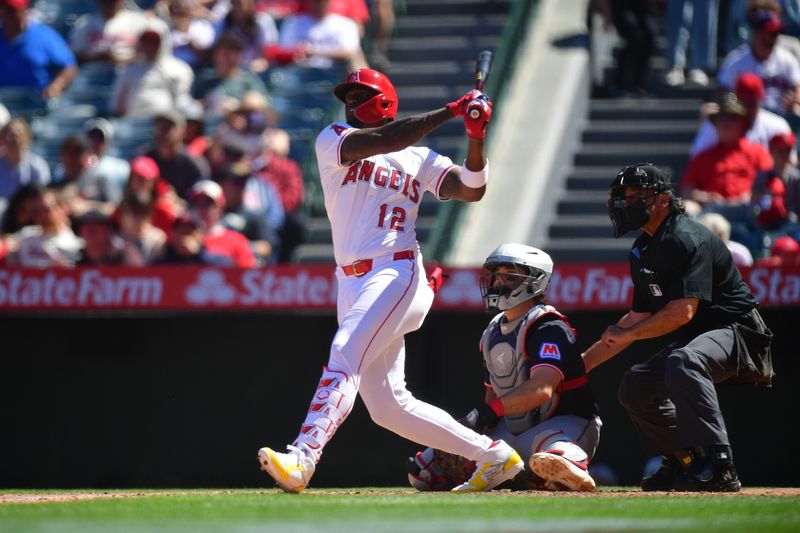 Apr 6, 2025; Anaheim, California, USA; Los Angeles Angels right fielder Jorge Soler (12) hits a solo home run against the Cleveland Guardians during the sixth inning at Angel Stadium. Mandatory Credit: Gary A. Vasquez-Imagn Images