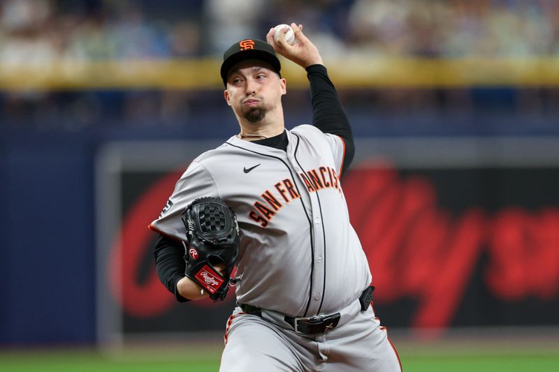 Apr 14, 2024; St. Petersburg, Florida, USA;  San Francisco Giants pitcher Blake Snell (7) throws a pitch against the Tampa Bay Rays in the first inning at Tropicana Field. Mandatory Credit: Nathan Ray Seebeck-USA TODAY Sports