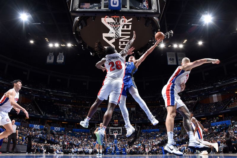 ORLANDO, FL - MARCH 3: Moritz Wagner #21 of the Orlando Magic drives to the basket during the game against the Detroit Pistons on March 3, 2024 at the Kia Center in Orlando, Florida. NOTE TO USER: User expressly acknowledges and agrees that, by downloading and or using this photograph, User is consenting to the terms and conditions of the Getty Images License Agreement. Mandatory Copyright Notice: Copyright 2024 NBAE (Photo by Fernando Medina/NBAE via Getty Images)