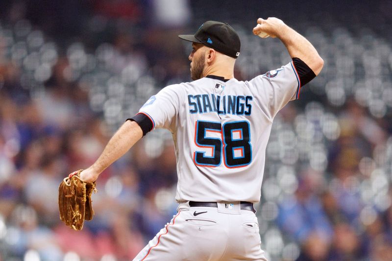 Sep 11, 2023; Milwaukee, Wisconsin, USA;  Miami Marlins catcher Jacob Stallings (58) throws a pitch during the eighth inning against the Milwaukee Brewers at American Family Field. Mandatory Credit: Jeff Hanisch-USA TODAY Sports