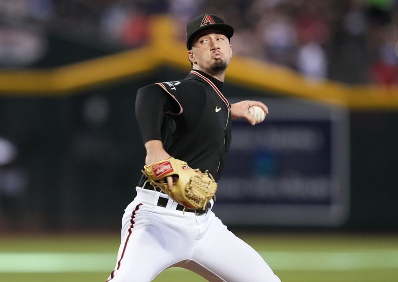 Sep 3, 2023; Phoenix, Arizona, USA; Arizona Diamondbacks relief pitcher Kyle Nelson (24) pitches against the Baltimore Orioles during the sixth inning at Chase Field. Mandatory Credit: Joe Camporeale-USA TODAY Sports