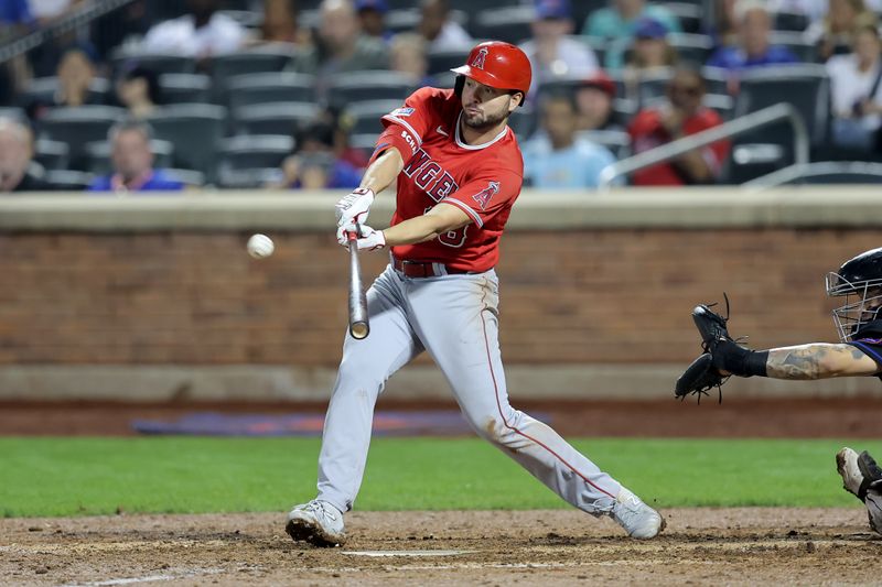 Aug 25, 2023; New York City, New York, USA; Los Angeles Angels first baseman Nolan Schanuel (18) follows through on an RBI single against the New York Mets during the ninth inning at Citi Field. Mandatory Credit: Brad Penner-USA TODAY Sports