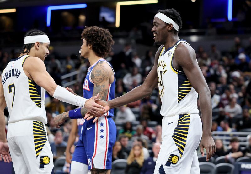 INDIANAPOLIS, INDIANA - JANUARY 25: Andrew Nembhard #2 and Pascal Siakam #43 of the Indiana Pacers celebrate against the Philadelphia 76ers during the second half of the game at Gainbridge Fieldhouse on January 25, 2024 in Indianapolis, Indiana.    NOTE TO USER: User expressly acknowledges and agrees that, by downloading and or using this photograph, User is consenting to the terms and conditions of the Getty Images License Agreement.  (Photo by Andy Lyons/Getty Images)