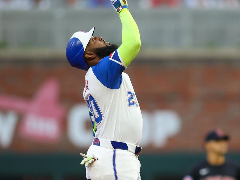 Apr 27, 2024; Atlanta, Georgia, USA; Atlanta Braves designated hitter Marcell Ozuna (20) reacts after a double against the Cleveland Guardians in the second inning at Truist Park. Mandatory Credit: Brett Davis-USA TODAY Sports