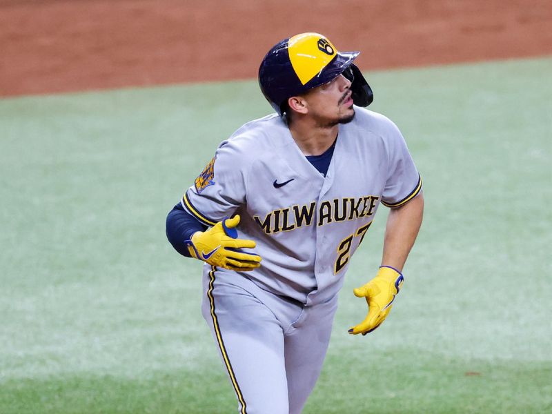 Aug 19, 2023; Arlington, Texas, USA;  Milwaukee Brewers shortstop Willy Adames (27) flips his bat after hitting a home run during the sixth inning against the Texas Rangers at Globe Life Field. Mandatory Credit: Kevin Jairaj-USA TODAY Sports