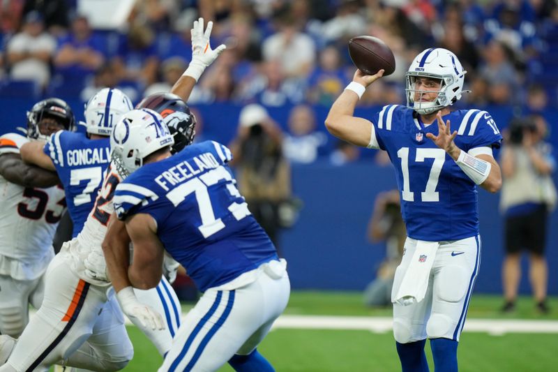 Indianapolis Colts quarterback Kedon Slovis (17) passes against the Denver Broncos during the third quarter of a preseason NFL football game, Sunday, Aug. 11, 2024, in Westfield, Ind. (AP Photo/AJ Mast)