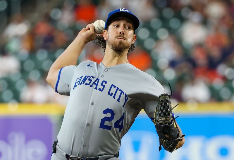 May 14, 2025; Houston, Texas, USA; Kansas City Royals starting pitcher Michael Lorenzen (24) pitches against the Houston Astros in the first inning at  Daikin Park. Mandatory Credit: Thomas Shea-Imagn Images