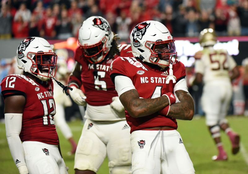 Oct 8, 2022; Raleigh, North Carolina, USA;North Carolina State Wolfpack safety Cyrus Fagan reacts after a defensive stop during the second half against the Florida State Seminoles at Carter-Finley Stadium. Mandatory Credit: Rob Kinnan-USA TODAY Sports