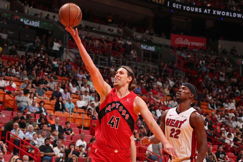 MIAMI, FL - APRIL 12:  Kelly Olynyk #41 of the Toronto Raptor shoots the ball during the game against the Miami Heat on April 12, 2024 at Kaseya Center in Miami, Florida. NOTE TO USER: User expressly acknowledges and agrees that, by downloading and or using this Photograph, user is consenting to the terms and conditions of the Getty Images License Agreement. Mandatory Copyright Notice: Copyright 2024 NBAE (Photo by Issac Baldizon/NBAE via Getty Images)