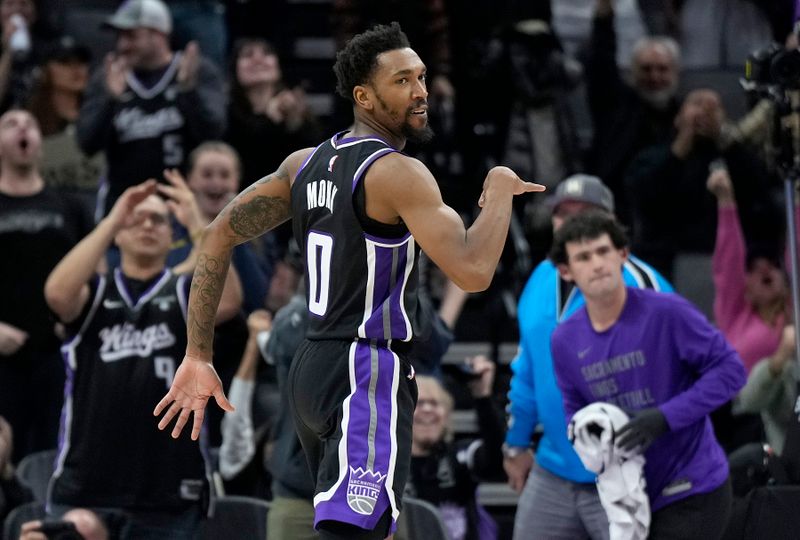 SACRAMENTO, CALIFORNIA - MARCH 07: Malik Monk #0 of the Sacramento Kings reacts after making a three-point shot to tie the game against the San Antonio Spurs late in second half at Golden 1 Center on March 07, 2024 in Sacramento, California. NOTE TO USER: User expressly acknowledges and agrees that, by downloading and or using this photograph, User is consenting to the terms and conditions of the Getty Images License Agreement. (Photo by Thearon W. Henderson/Getty Images)