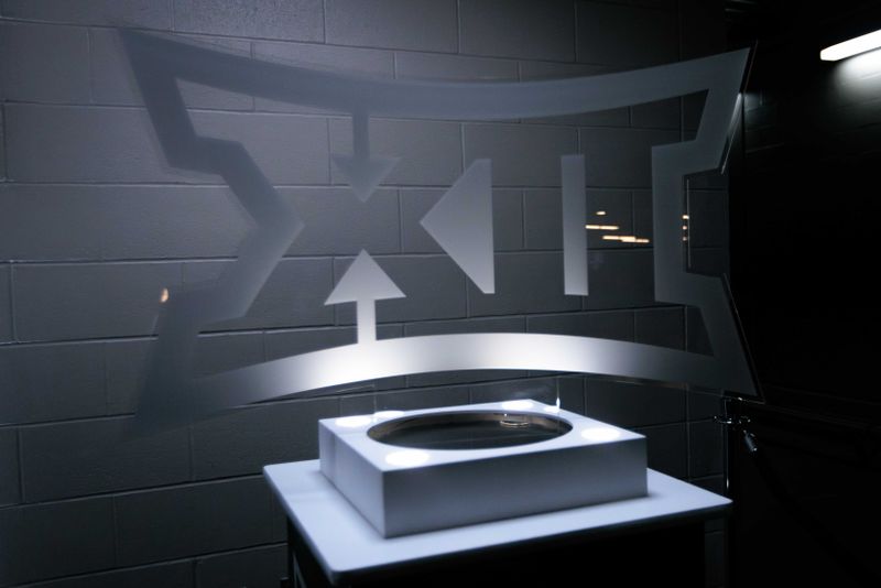 Mar 12, 2024; Kansas City, MO, USA; Glass Big 12 emblem at the court entrance at T-Mobile Center. Mandatory Credit: William Purnell-USA TODAY Sports