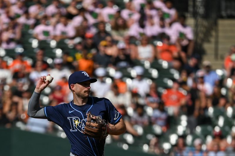 Jun 1, 2024; Baltimore, Maryland, USA; Tampa Bay Rays second baseman Brandon Lowe (8) throws to first base during he second inning against the Baltimore Orioles  at Oriole Park at Camden Yards. Mandatory Credit: Tommy Gilligan-USA TODAY Sports