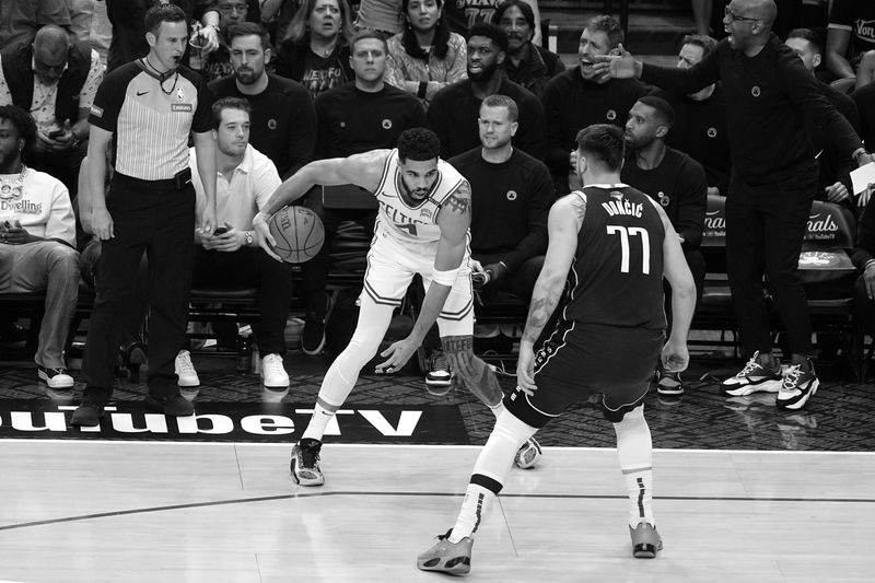 DALLAS, TX - JUNE 12: Jayson Tatum #0 of the Boston Celtics handles the ball during the game against the Dallas Mavericks during Game Three of the 2024 NBA Finals on June 12, 2024 at the American Airlines Center in Dallas, Texas. NOTE TO USER: User expressly acknowledges and agrees that, by downloading and or using this photograph, User is consenting to the terms and conditions of the Getty Images License Agreement. Mandatory Copyright Notice: Copyright 2024 NBAE (Photo by Glenn James/NBAE via Getty Images)