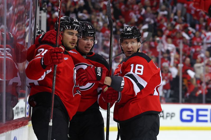 Apr 27, 2025; Newark, New Jersey, USA; New Jersey Devils right wing Timo Meier (28) celebrates his goal against the Carolina Hurricanes during the second period in game four of the first round of the 2025 Stanley Cup Playoffs at Prudential Center. Mandatory Credit: Ed Mulholland-Imagn Images