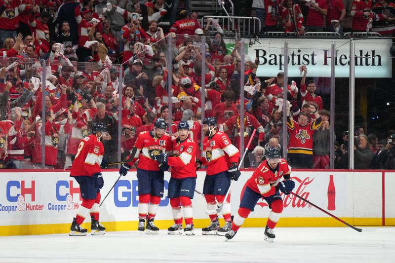 Jun 10, 2024; Sunrise, Florida, USA; Florida Panthers forward Evan Rodrigues (17) celebrates scoring against the Edmonton Oilers during the third period in game two of the 2024 Stanley Cup Final at Amerant Bank Arena. Mandatory Credit: Jim Rassol-USA TODAY Sports