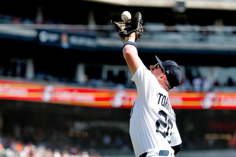 Sep 18, 2025; Detroit, Michigan, USA;  Detroit Tigers first base Spencer Torkelson (20) makes a catch in the first inning against the Cleveland Guardians at Comerica Park. Mandatory Credit: Rick Osentoski-Imagn Images