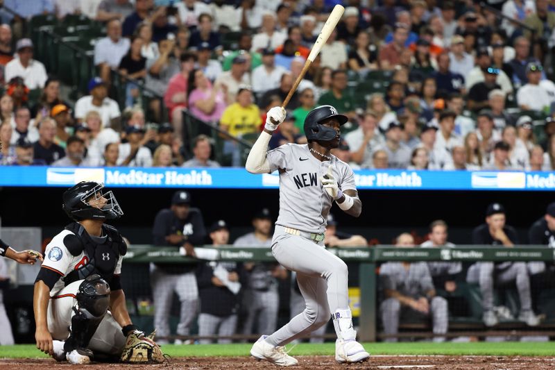 Sep 18, 2025; Baltimore, Maryland, USA; New York Yankees second baseman Jazz Chisholm Jr. (13) hits a double during the sixth inning against the Baltimore Orioles at Oriole Park at Camden Yards. Mandatory Credit: Daniel Kucin Jr.-Imagn Images