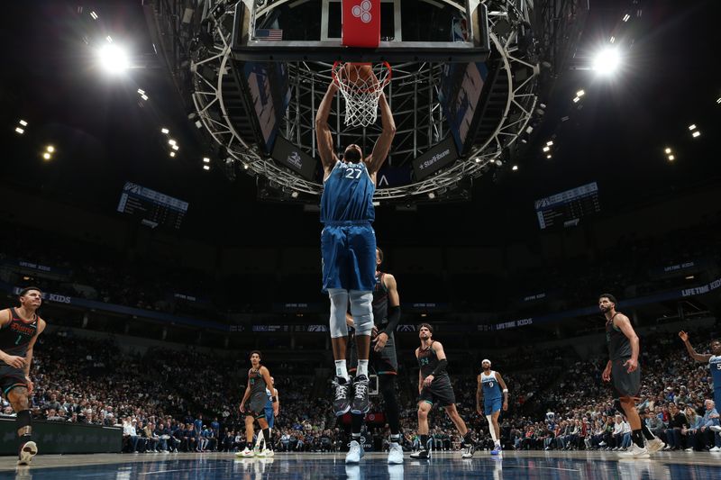 MINNEAPOLIS, MN -  APRIL 9:  Rudy Gobert #27 of the Minnesota Timberwolves dunks the ball during the game against the Washington Wizards on April 9, 2024 at Target Center in Minneapolis, Minnesota. NOTE TO USER: User expressly acknowledges and agrees that, by downloading and or using this Photograph, user is consenting to the terms and conditions of the Getty Images License Agreement. Mandatory Copyright Notice: Copyright 2024 NBAE (Photo by David Sherman/NBAE via Getty Images)