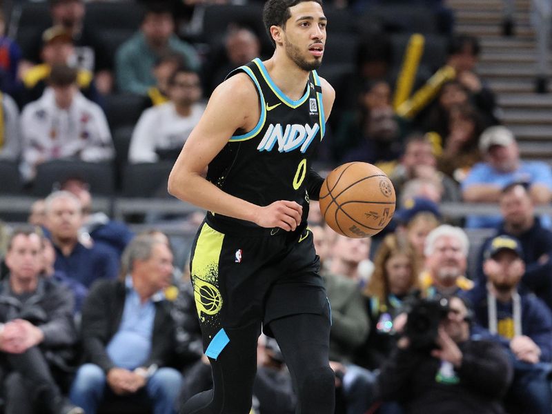 INDIANAPOLIS, INDIANA - APRIL 05: Tyrese Haliburton #0 of the Indiana Pacers dribbles the ball against the Oklahoma City Thunder in the second half at Gainbridge Fieldhouse on April 05, 2024 in Indianapolis, Indiana.    NOTE TO USER: User expressly acknowledges and agrees that, by downloading and or using this photograph, User is consenting to the terms and conditions of the Getty Images License Agreement.  (Photo by Andy Lyons/Getty Images)