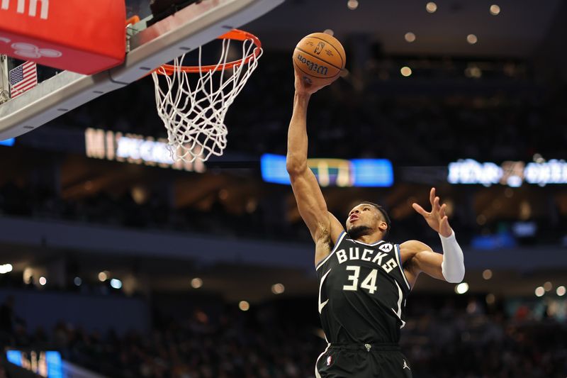 MILWAUKEE, WISCONSIN - NOVEMBER 22: Giannis Antetokounmpo #34 of the Milwaukee Bucks dunks against the Indiana Pacers during the second half of a game in the NBA Emirates Cup at Fiserv Forum on November 22, 2024 in Milwaukee, Wisconsin. NOTE TO USER: User expressly acknowledges and agrees that, by downloading and or using this photograph, User is consenting to the terms and conditions of the Getty Images License Agreement. (Photo by Stacy Revere/Getty Images)