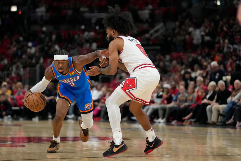 CHICAGO, ILLINOIS - OCTOBER 26: Shai Gilgeous-Alexander #2 of the Oklahoma City Thunder dribbles the ball against Coby White #0 of the Chicago Bulls at the United Center on October 26, 2024 in Chicago, Illinois. NOTE TO USER: User expressly acknowledges and agrees that, by downloading and or using this photograph, User is consenting to the terms and conditions of the Getty Images License Agreement. (Photo by Patrick McDermott/Getty Images)