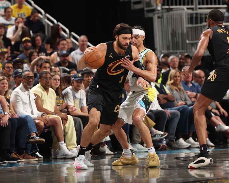 INDIANAPOLIS, IN - MAY 11:  Max Strus #1 of the Cleveland Cavaliers dribbles the ball during the game against the Indiana Pacers  during Round 2 Game 3 of the 2025 NBA Playoffs  on May 11, 2025 at Gainbridge Fieldhouse in Indianapolis, Indiana. NOTE TO USER: User expressly acknowledges and agrees that, by downloading and or using this Photograph, user is consenting to the terms and conditions of the Getty Images License Agreement. Mandatory Copyright Notice: Copyright 2025 NBAE (Photo by Joe MurphyNBAE via Getty Images)