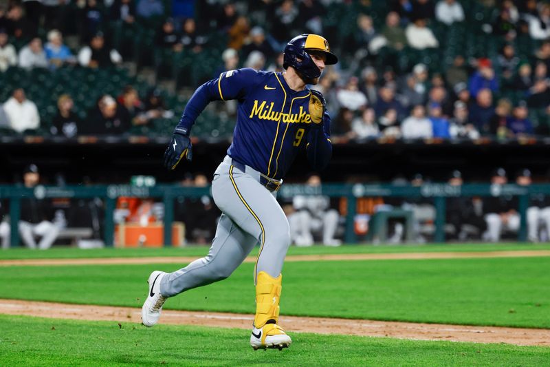 Apr 30, 2025; Chicago, Illinois, USA; Milwaukee Brewers left fielder Jake Bauers (9) runs after hitting a two-run double against the Chicago White Sox during the eight inning at Rate Field. Mandatory Credit: Kamil Krzaczynski-Imagn Images