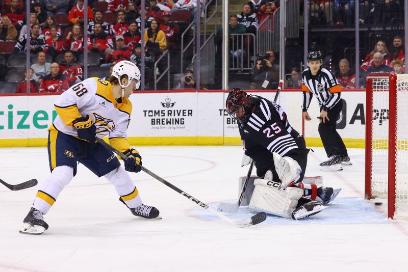 Nov 25, 2024; Newark, New Jersey, USA; Nashville Predators left wing Zachary L'Heureux (68) scores a goal on New Jersey Devils goaltender Jacob Markstrom (25) during the third period at Prudential Center. Mandatory Credit: Ed Mulholland-Imagn Images