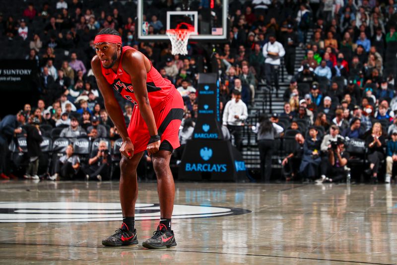 BROOKLYN, NY - OCTOBER 18: Immanuel Quickley #5 of the Toronto Raptors looks on during the game on October 18, 2024 at Barclays Center in Brooklyn, New York. NOTE TO USER: User expressly acknowledges and agrees that, by downloading and or using this Photograph, user is consenting to the terms and conditions of the Getty Images License Agreement. Mandatory Copyright Notice: Copyright 2024 NBAE (Photo by David L. Nemec/NBAE via Getty Images)