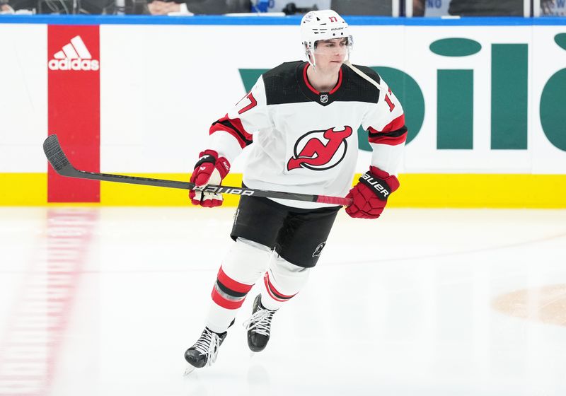 Mar 26, 2024; Toronto, Ontario, CAN; New Jersey Devils defenseman Simon Nemec (17) skates during the warmup before a game against the Toronto Maple Leafs at Scotiabank Arena. Mandatory Credit: Nick Turchiaro-USA TODAY Sports