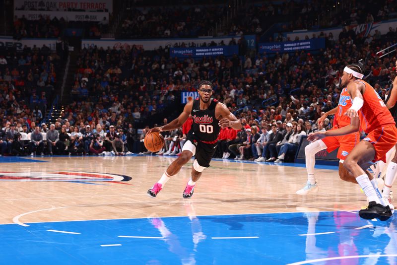 OKLAHOMA CITY, OK - JANUARY 23: Scoot Henderson #00 of the Portland Trail Blazers drives to the basket during the game against the Oklahoma City Thunder on January 23, 2024 at Paycom Arena in Oklahoma City, Oklahoma. NOTE TO USER: User expressly acknowledges and agrees that, by downloading and or using this photograph, User is consenting to the terms and conditions of the Getty Images License Agreement. Mandatory Copyright Notice: Copyright 2024 NBAE (Photo by Zach Beeker/NBAE via Getty Images)