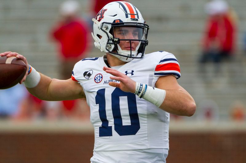 Oct 24, 2020; Oxford, Mississippi, USA; Auburn Tigers quarterback Bo Nix (10) warms up before the game against the Mississippi Rebels  at Vaught-Hemingway Stadium. Mandatory Credit: Justin Ford-USA TODAY Sports