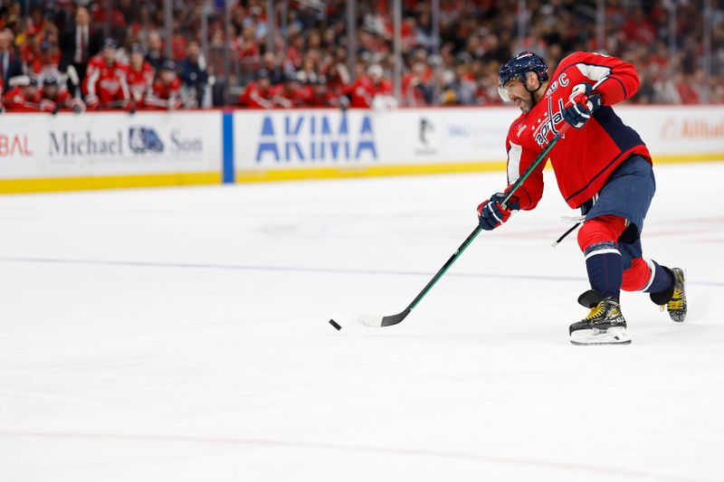 Nov 8, 2024; Washington, District of Columbia, USA; Washington Capitals left wing Alex Ovechkin (8) shoots the puck against the Pittsburgh Penguins in the third period at Capital One Arena. Mandatory Credit: Geoff Burke-Imagn Images