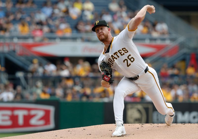 Aug 17, 2024; Pittsburgh, Pennsylvania, USA;  Pittsburgh Pirates starting pitcher Bailey Falter (26) delivers a pitch against the Seattle Mariners during the first inning at PNC Park. Mandatory Credit: Charles LeClaire-USA TODAY Sports