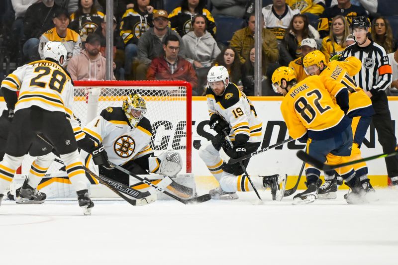 Oct 22, 2024; Nashville, Tennessee, USA; Nashville Predators center Tommy Novak (82) scores a goal last Boston Bruins goaltender Jeremy Swayman (1) during the second period at Bridgestone Arena. Mandatory Credit: Steve Roberts-Imagn Images