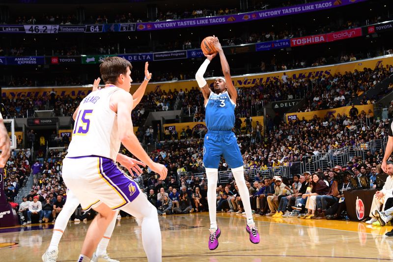 LOS ANGELES, CA - MARCH 10: Jaden McDaniels #3 of the Minnesota Timberwolves shoots the ball during the game against the Los Angeles Lakers on March 10, 2024 at Crypto.Com Arena in Los Angeles, California. NOTE TO USER: User expressly acknowledges and agrees that, by downloading and/or using this Photograph, user is consenting to the terms and conditions of the Getty Images License Agreement. Mandatory Copyright Notice: Copyright 2024 NBAE (Photo by Adam Pantozzi/NBAE via Getty Images)