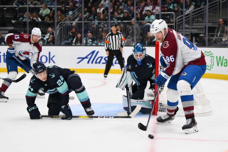 Nov 13, 2023; Seattle, Washington, USA; Colorado Avalanche right wing Mikko Rantanen (96) plays the puck against the Seattle Kraken during the third period at Climate Pledge Arena. Mandatory Credit: Steven Bisig-USA TODAY Sports