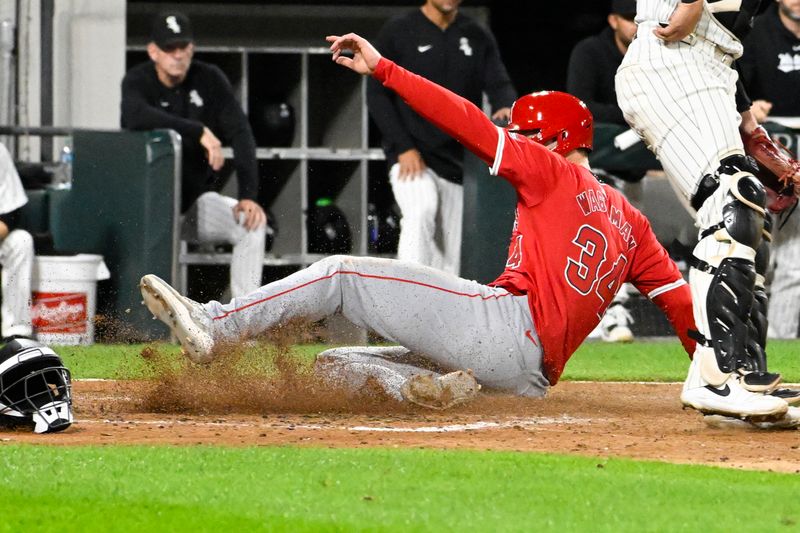 Sep 25, 2024; Chicago, Illinois, USA;  Los Angeles Angels first baseman Eric Wagaman (34) scores against the Chicago White Sox during the eighth inning at Guaranteed Rate Field. Mandatory Credit: Matt Marton-Imagn Images