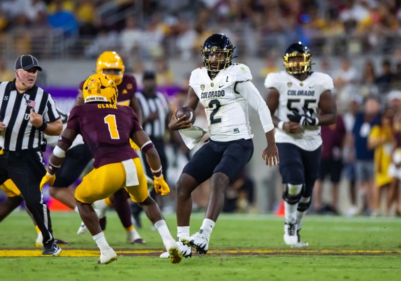 Oct 7, 2023; Tempe, Arizona, USA; Colorado Buffaloes quarterback Shedeur Sanders (2) runs the ball against the Arizona State Sun Devils in the second half at Mountain America Stadium, Home of the ASU Sun Devils. Mandatory Credit: Mark J. Rebilas-USA TODAY Sports