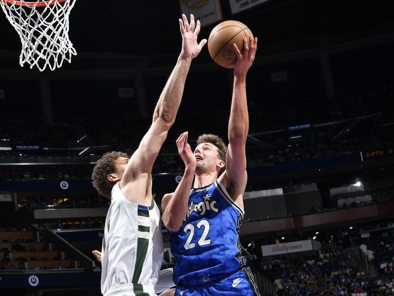 ORLANDO, FL - APRIL 14: Franz Wagner #22 of the Orlando Magic drives to the basket during the game against the Milwaukee Bucks on April 14, 2024 at Kia Center in Orlando, Florida. NOTE TO USER: User expressly acknowledges and agrees that, by downloading and or using this photograph, User is consenting to the terms and conditions of the Getty Images License Agreement. Mandatory Copyright Notice: Copyright 2024 NBAE (Photo by Fernando Medina/NBAE via Getty Images)