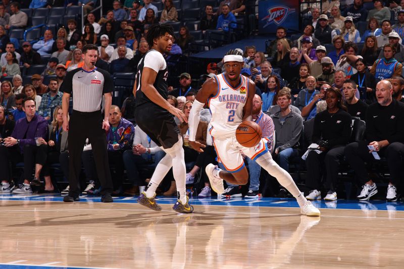 OKLAHOMA CITY, OK - NOVEMBER 20: Shai Gilgeous-Alexander #2 of the Oklahoma City Thunder dribbles the ball during the game against the Portland Trail Blazers on November 20, 2024 at Paycom Center in Oklahoma City, Oklahoma. NOTE TO USER: User expressly acknowledges and agrees that, by downloading and or using this photograph, User is consenting to the terms and conditions of the Getty Images License Agreement. Mandatory Copyright Notice: Copyright 2024 NBAE (Photo by Zach Beeker/NBAE via Getty Images)