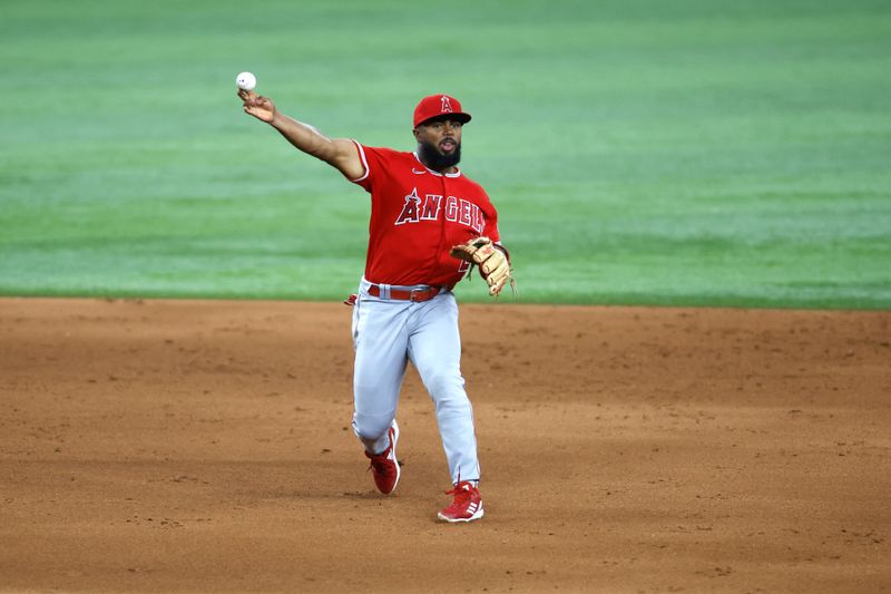 Aug 14, 2023; Arlington, Texas, USA; Los Angeles Angels third baseman Luis Rengifo (2) throws to first base in the sixth inning against the Texas Rangers at Globe Life Field. Mandatory Credit: Tim Heitman-USA TODAY Sports