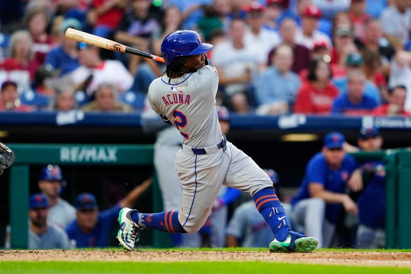 Sep 14, 2024; Philadelphia, Pennsylvania, USA; New York Mets shortstop Luisangel Acuna (2) hits a single against the Philadelphia Phillies during the ninth inning at Citizens Bank Park. Mandatory Credit: Gregory Fisher-Imagn Images