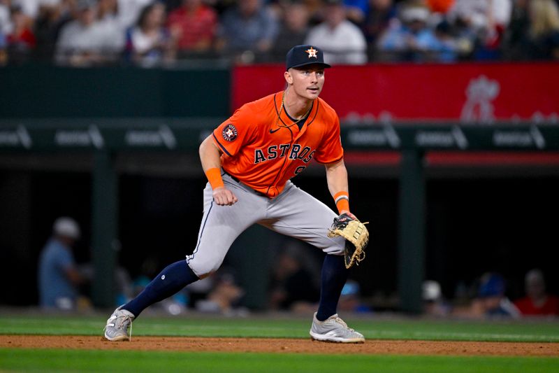 Aug 7, 2024; Arlington, Texas, USA;  Houston Astros first baseman Zach Dezenzo (9) looks for the ball during the fifth inning against the Texas Rangers at Globe Life Field. Mandatory Credit: Jerome Miron-USA TODAY Sports