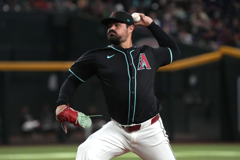 May 7, 2025; Phoenix, Arizona, USA; Arizona Diamondbacks pitcher José Castillo (66) throws against the New York Mets in the ninth inning at Chase Field. Mandatory Credit: Rick Scuteri-Imagn Images