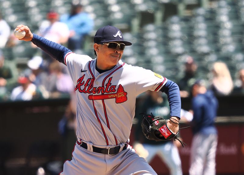 May 31, 2023; Oakland, California, USA; Atlanta Braves relief pitcher Jesse Chavez (60) pitches the ball against the Oakland Athletics during the sixth inning at Oakland-Alameda County Coliseum. Mandatory Credit: Kelley L Cox-USA TODAY Sports