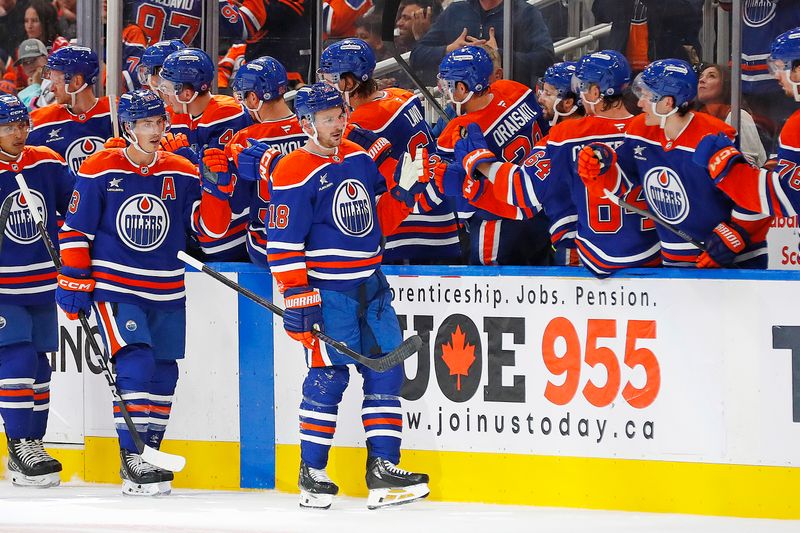 Sep 23, 2024; Edmonton, Alberta, CAN; The Edmonton Oilers celebrate a goal scored by forward Zach Hyman (18) during the second period against the Calgary Flames at Rogers Place. Mandatory Credit: Perry Nelson-Imagn Images