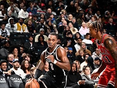 BROOKLYN, NY - NOVEMBER 26: Lonnie Walker IV #8 of the Brooklyn Nets drives to the basket during the game against the Chicago Bulls on November 26, 2023 at Barclays Center in Brooklyn, New York. NOTE TO USER: User expressly acknowledges and agrees that, by downloading and or using this Photograph, user is consenting to the terms and conditions of the Getty Images License Agreement. Mandatory Copyright Notice: Copyright 2023 NBAE (Photo by David Dow/NBAE via Getty Images)