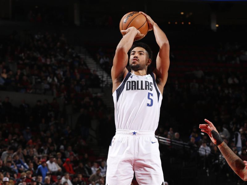 PORTLAND, OR - DECEMBER 1: Quentin Grimes #5 of the Dallas Mavericks shoots the ball during the game against the Portland Trail Blazers on December 1, 2024 at the Moda Center Arena in Portland, Oregon. NOTE TO USER: User expressly acknowledges and agrees that, by downloading and or using this photograph, user is consenting to the terms and conditions of the Getty Images License Agreement. Mandatory Copyright Notice: Copyright 2024 NBAE (Photo by Cameron Browne/NBAE via Getty Images)